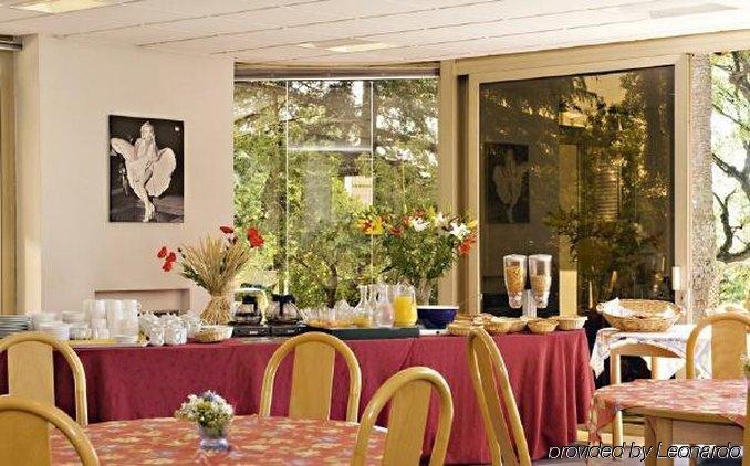 Les Genevriers Leilighet Cannes Restaurant bilde